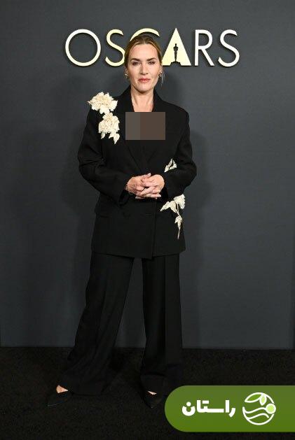 تصاویر | «کیت وینسلت» با کت‌وشلوار مشکی با گل‌های برجسته سفید روی فرش قرمز