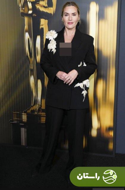 تصاویر | «کیت وینسلت» با کت‌وشلوار مشکی با گل‌های برجسته سفید روی فرش قرمز