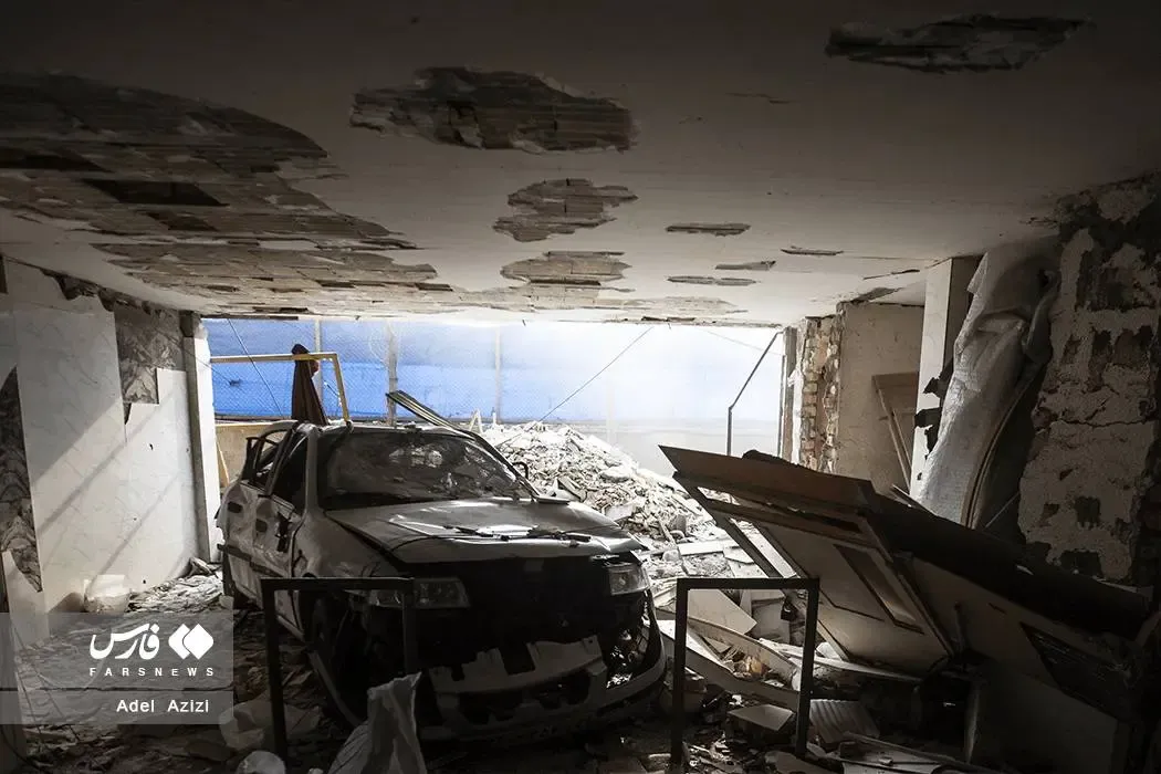 خسارت حمله هوایی به مجتمع مسکونی نارنجستان اراک