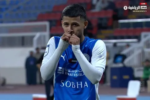 عکس‌های کریسمسی مهدی قائدی با همسر و فرزندش