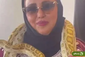 ویدئوی عجیب بهنوش بختیاری با یک مار بزرگ دور گردنش