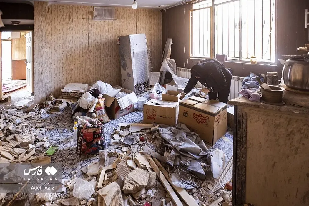 خسارت حمله هوایی به مجتمع مسکونی نارنجستان اراک