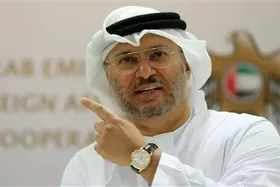 انور قرقاش: ایران باید غرامت بدهد