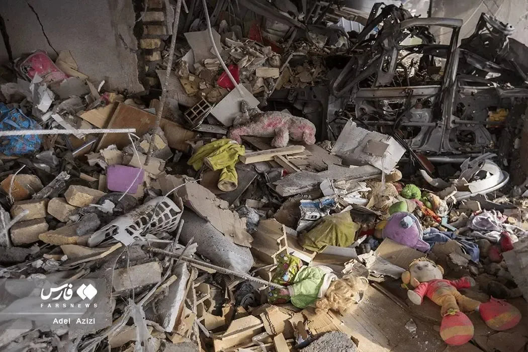 خسارت حمله هوایی به مجتمع مسکونی نارنجستان اراک