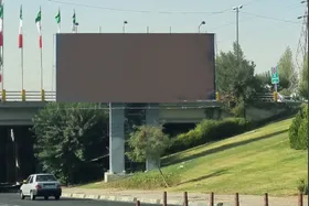 (عکس) مسیح علی‌نژاد و علی شریفی زارچی کنار هم روی بیلبورد‌های تهران