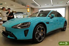 تصویر | خودروی شیائومی زیر کامیون گل کاشت