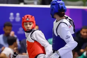 (عکس) قهرمانی ساینا کریمی در ریاض و سلام نظامی مهروز ساعی