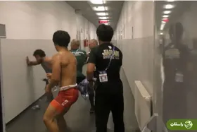 ماجرای کتک‌کاری قهرمانان کشتی جهان روی تشک و داخل تونل! + تصاویر