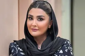 عکس متفاوت خانم بازیگرِ سابق تلویزیون کنار دریا با یک سگ